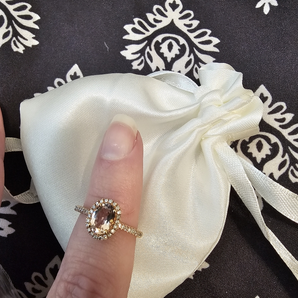 New, unworn.  10k 7/8 CT Morganite Oval Cut.